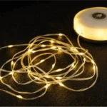 Draagbare en oprolbare lichtslinger met slinger